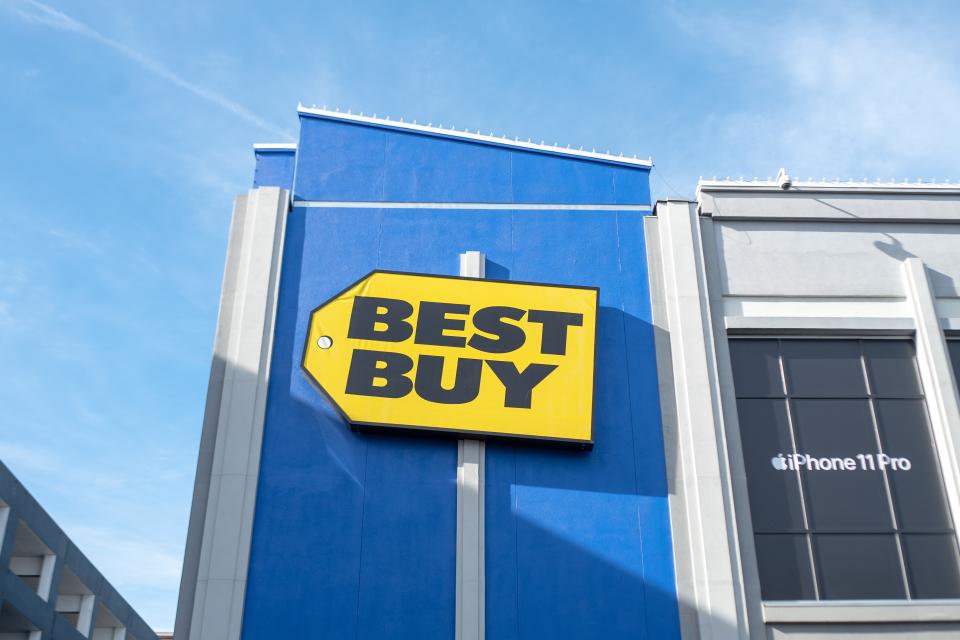 Low-angle view of sign with logo on facade of Best Buy electronics retail store on Santana Row in the Silicon Valley, San Jose, California, January 3, 2020. (Photo by Smith Collection/Gado/Getty Images)