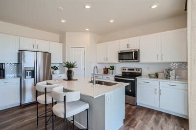 Vail II Model Home Kitchen | The Aurora Highlands | Single-Family Homes for Sale in Aurora, CO by Century Communities