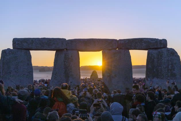 21st JUNE 2019 - SALISBURY, UK - Crowds gather to watch the 2019 summer solstice sunrise at the ancient stone circle of Stonehenge, Salisbury Plain, England, United Kingdom. (Photo: Chris Griffiths via Getty Images)