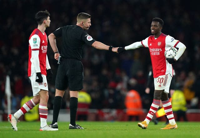 Eddie Nketiah (right) celebrates with the match ball