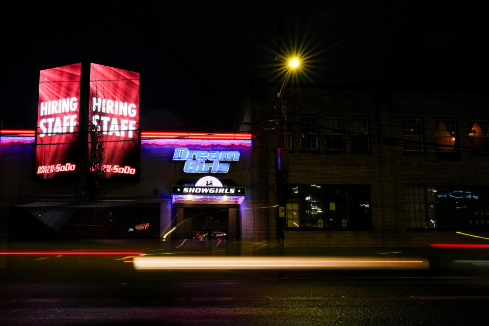 The Dream Girls at SoDo strip club, Monday, Feb. 5, 2024, in Seattle. Adult dancers are fighting for bills to pass in the state Legislature that would expand statewide protections to workers, like having a security guard at each club, keypad codes to enter dressing rooms and deescalation training. (AP Photo/Lindsey Wasson)