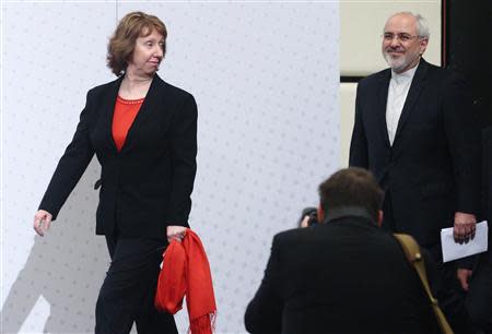 European Union foreign policy chief Catherine Ashton (L) and Iranian Foreign Minister Mohammad Javad Zarif arrive for a press statement after a conference in Vienna February 20, 2014. REUTERS/Heinz-Peter Bader