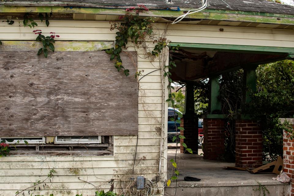 Windows are covered by plywood at the Colvin House on D Street in Lake Wales. The 1920 house, recommended for demolition by the city last year, was included on the Florida Trust for Historic Preservation's "11 to Save" list for 2022. It is one of the oldest remaining structures in the Northwest Neighborhood.