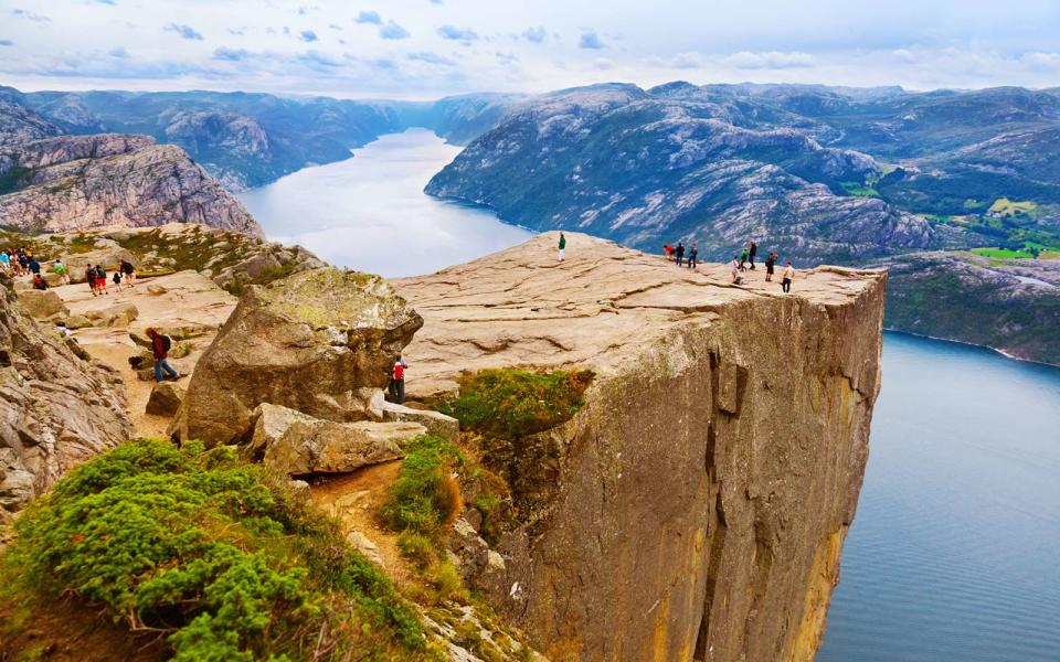 Preikestolen, also known as "the pulpit rock," stands nearly 2,000 feet tall.