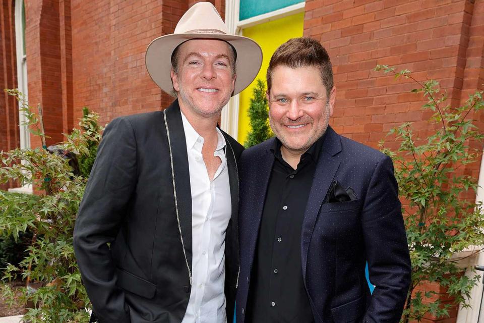 <p>Jason Kempin/Getty Images</p> Joe Don Rooney and Jay DeMarcus attend the ACM Honors in Nashville in August 2021