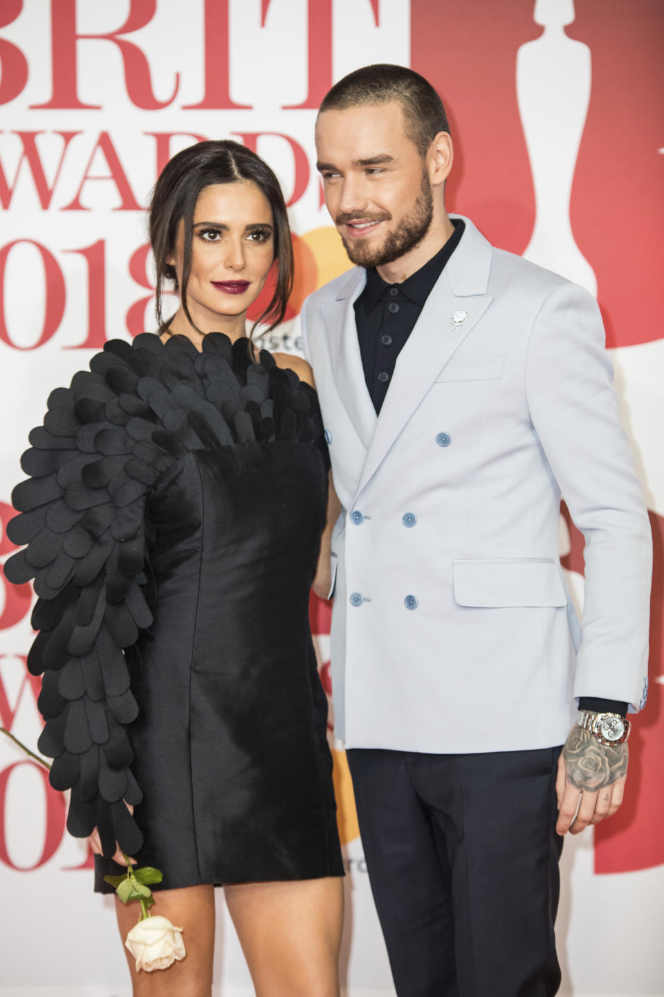 Singers Cheryl, left, and Liam Payne pose for photographers upon arrival at the Brit Awards 2018 in London, Wednesday, Feb. 21, 2018. (Photo by Vianney Le Caer/Invision/AP)