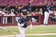 Dallas Baptist's Glenn Jackson watches his home run in the third inning during an NCAA college baseball tournament super regional game against Virginia on Monday, June 14, 2021, in Columbia, S.C. (AP Photo/Sean Rayford)