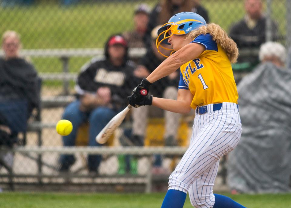 Castle's Jackie Lis (1) hits the ball as the Castle Knights  play the Boonville Pioneers during the 2021 Warrick County softball showcase in Newburgh, Ind., Saturday afternoon, May 15, 2021. 