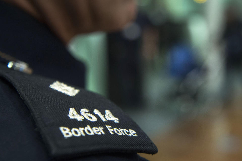 Embargoed to 1800 Tuesday September 12 A UK Border Force officer watches over passengers arriving from Paris on the Eurostar as officers from the Metropolitan Police Service, British Transport Police, Kent Police and UK Border Force take part in Operation Limelight at the Eurostar terminal at St Pancras International in London, which is aimed at safeguarding children and vulnerable people from harmful practices and human trafficking.