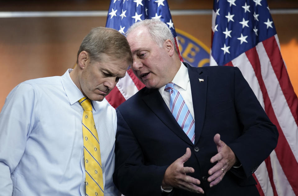 FILE—Rep. Jim Jordan, R-Ohio, left, and Rep. Steve Scalise, R-La., confer during a news conference at the Capitol in Washington, Wednesday, June 8, 2022. The two GOP leaders have emerged as contenders to replace former House Speaker Kevin McCarthy who was voted out of the job by a contingent of hard-right conservatives. Jordan is now chairman of the House Judiciary Committee and a staunch ally of former President Donald Trump. House Majority Leader Steve Scalise, R-La., has long sought the top post. (AP Photo/J. Scott Applewhite, File)