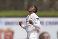 Sri Lanka's Jeffrey Vandersay celebrates taking the wicket of Australia's Usman Khawaja during the day two of the first test cricket match between Australia and Sri Lanka in Galle, Sri Lanka, Thursday, June 30, 2022. (AP Photo/Eranga Jayawardena)