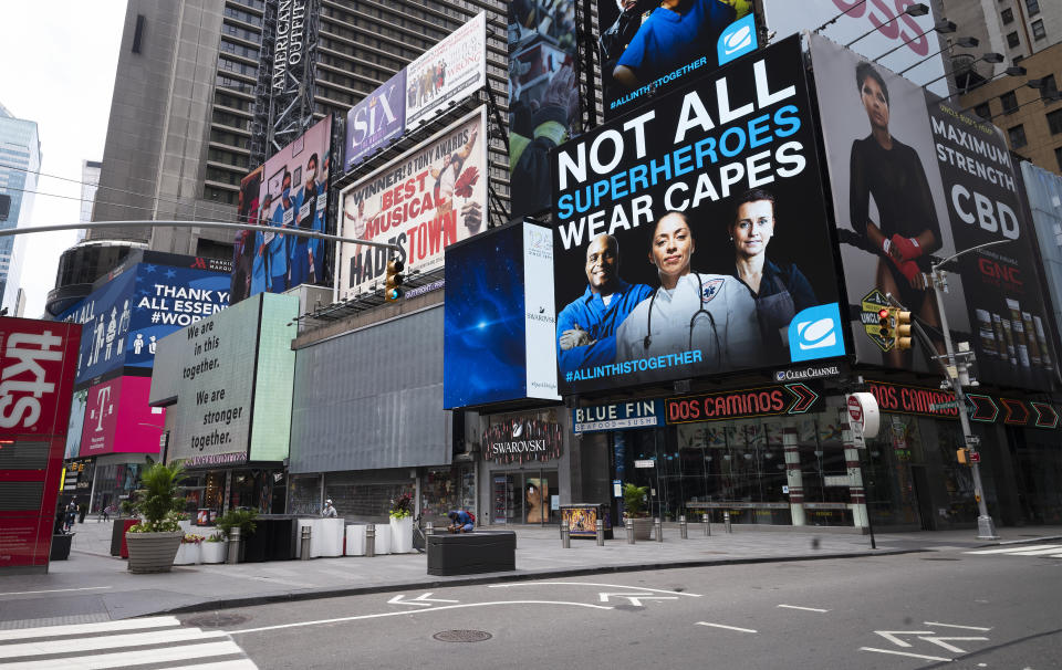 New York's Times Square is quiet on Friday, May 29, 2020. There's a certain kind of silent on the streets of Manhattan. Not the "summertime and the living is easy" vacation lull, or the post-Christmas holidays letdown. It's the only-person-in-the-empty-house kind of quiet now. (AP Photo/Mark Lennihan)