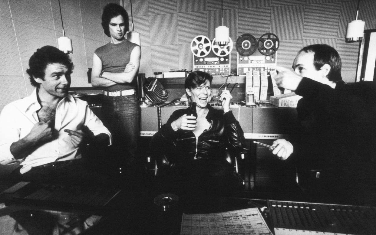 (L-R) Robert Fripp, Brian Eno, David Bowie and Hansa Tonstudio during the recording of the album, Heroes - Getty