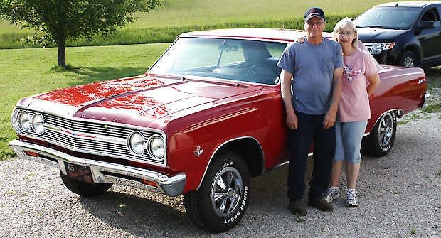 Roger and Brenda Hardisty stand by their newly restored 1965 Chevrolet Chevelle. Courtesy photo