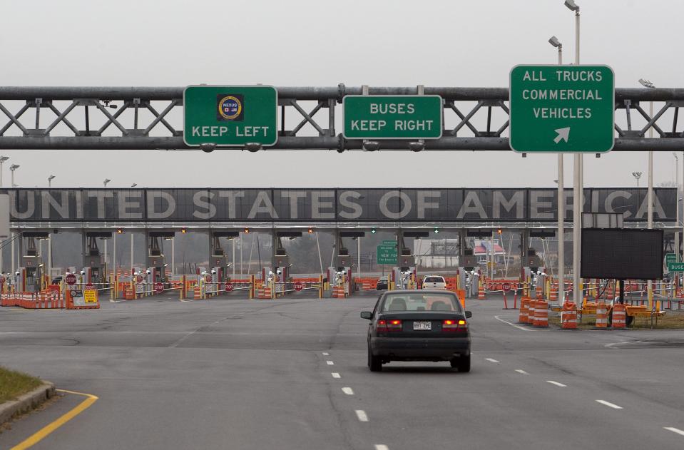 In this Wednesday, Dec. 7, 2011 file photo, a car approaches the United States and Canada border crossing in Lacolle, Quebec, south of Montreal. | Ryan Remiorz, Associated Press