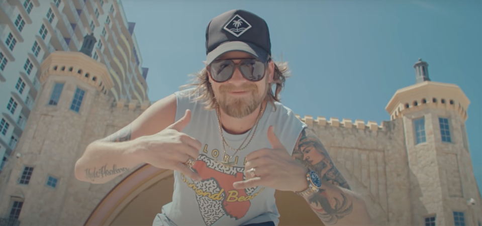 Brian Kelley performs in front of the Bandshell in Daytona Beach in the music video for his song "Florida Boy Forever."