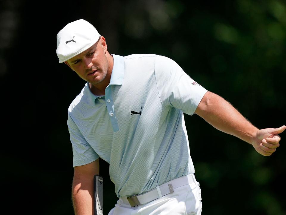 Bryson DeChambeau reacts to a shot at the 2021 Rocket Mortgage Classic.