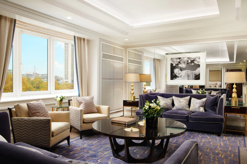 luxury apartment lounge with purple sofas