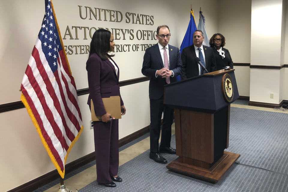 Kevin Ritz, the U.S. Attorney for the federal district in West Tennessee, center, speaks with reporters about charges filed against five former Memphis Police Department officers in connection with the violent beating and death of Tyre Nichols, Tuesday, Sept. 12, 2023, in Memphis, Tenn. (AP Photo/Adrian Sainz)