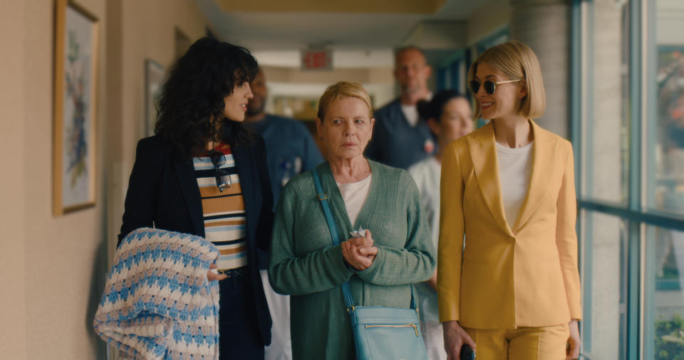 This image released by Netflix shows, from left, Eiza Gonzalez, Dianne Wiest and Rosamund Pike in a scene from "I Care A Lot." (Seacia Pavao/Netflix via AP)