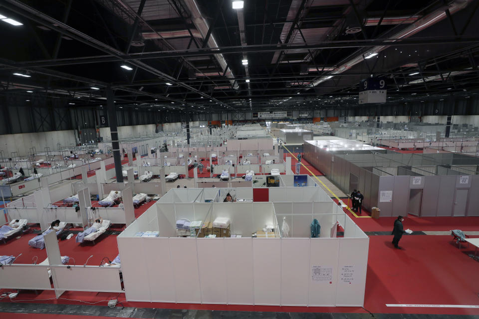 A general view a temporary field hospital set at Ifema convention and exhibition of in Madrid, Spain, Thursday, April 2, 2020. The new coronavirus causes mild or moderate symptoms for most people, but for some, especially older adults and people with existing health problems, it can cause more severe illness or death. (AP Photo/Manu Fernandez)