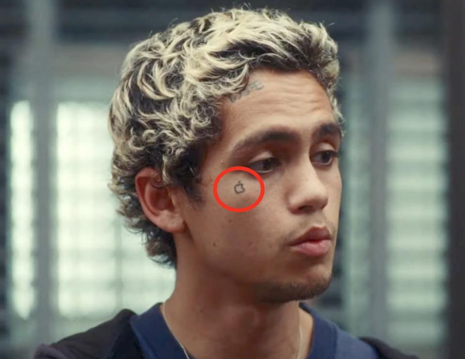 circle around an apple logo on someone's face