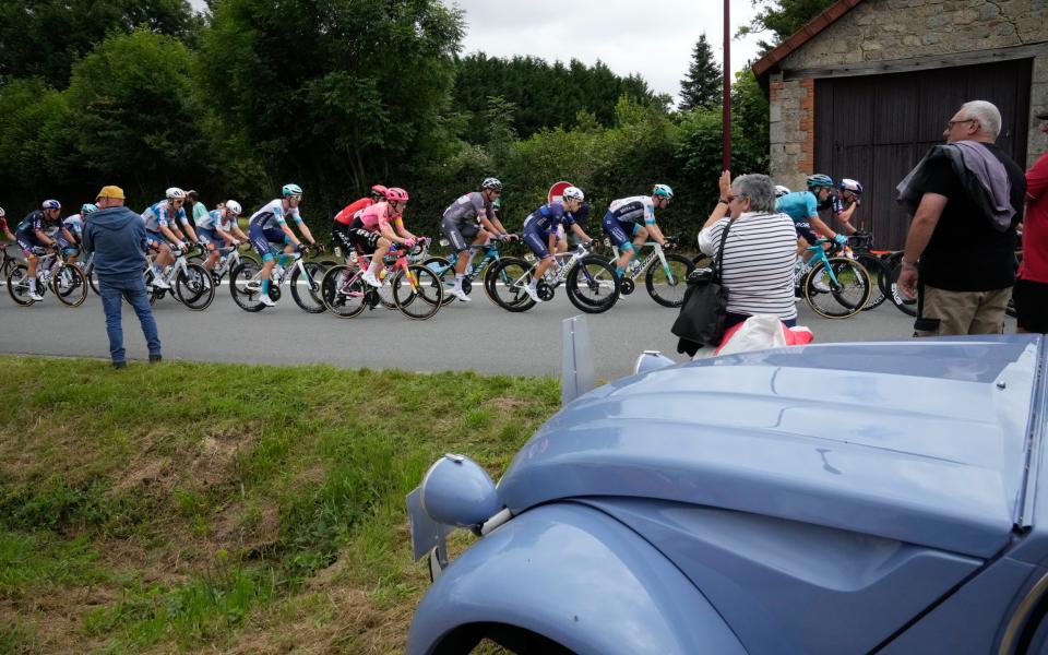 The peloton passes by