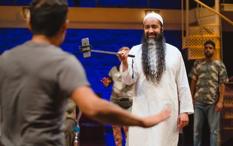 Asif Khan as Tartuffe - Credit: Topher McGrillis/RSC