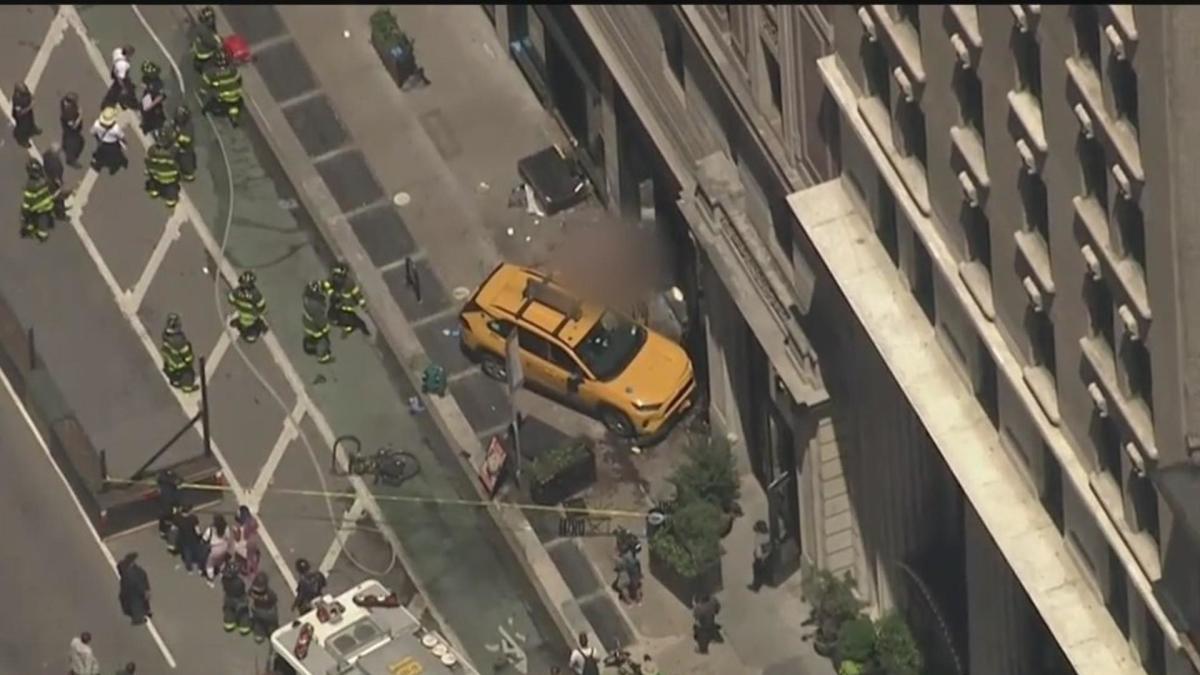 3 critically injured when NYC taxi jumps curb, hits building