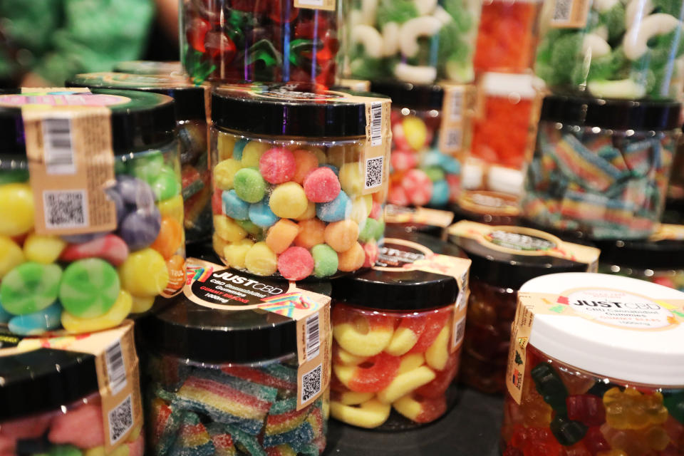 Emoji gummies by JustCBD are displayed at the Cannabis World Congress & Business Exposition trade show, Thursday, May 30, 2019 in New York. The treats contain non-psychoactive cannabidiol, CBD. (AP Photo/Jeremy Rehm)