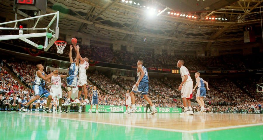 4 APR 1994: Duke University center Cherokee Parks (44) and University of Arkansas center Lee Wilson (33) go up for the rebound during the NCAA Photos via Getty Images National Basketball Championship game at the Charlotte Coliseum in Charlotte, NC. Arkansas defeated Duke 76-72 to win the championship title.