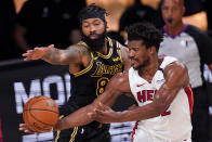 Los Angeles Lakers forward Markieff Morris vies for a rebound with Miami Heat forward Jimmy Butler during the second half in Game 5 of basketball's NBA Finals Friday, Oct. 9, 2020, in Lake Buena Vista, Fla. (AP Photo/Mark J. Terrill)