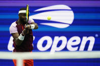 Frances Tiafoe, of the United States, returns a shot to Carlos Alcaraz, of Spain, during the semifinals of the U.S. Open tennis championships, Friday, Sept. 9, 2022, in New York. (AP Photo/Matt Rourke)