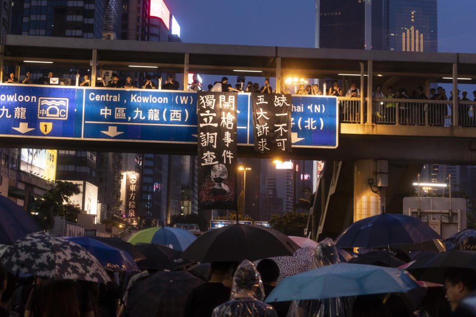 People take part in a demonstration on August 18, 2019 in Hong Kong, China. Pro-democracy protesters have continued rallies on the streets of Hong Kong against a controversial extradition bill since 9 June as the city plunged into crisis after waves of demonstrations and several violent clashes. Hong Kong's Chief Executive Carrie Lam apologized for introducing the bill and declared it &quot;dead&quot;, however protesters have continued to draw large crowds with demands for Lam's resignation and complete withdrawal of the bill. (Photo by Delphia Ip/NurPhoto via Getty Images)