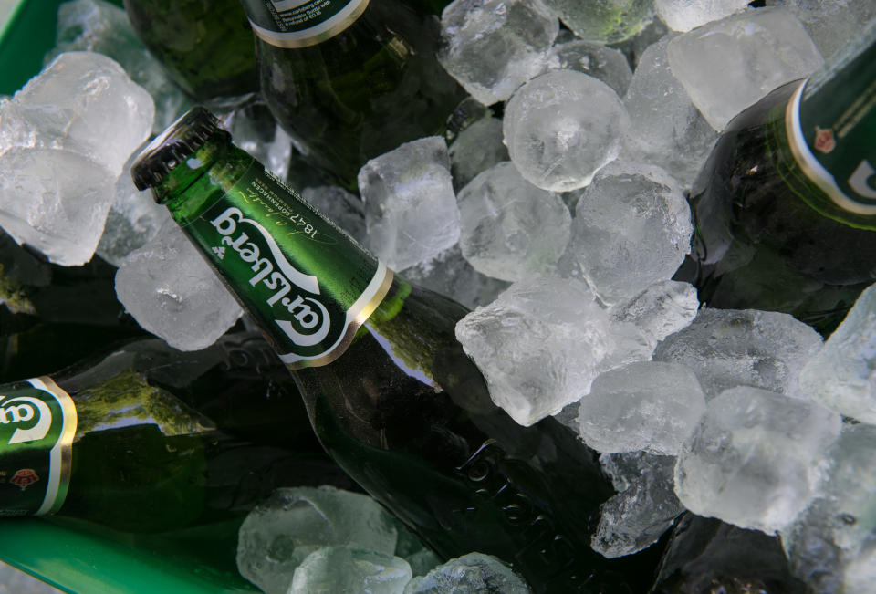 May 1, 2016: Nicosia, Cyprus - May 7 2016: Small green bottles of famous Carlsberg beer on ice ready to be served.