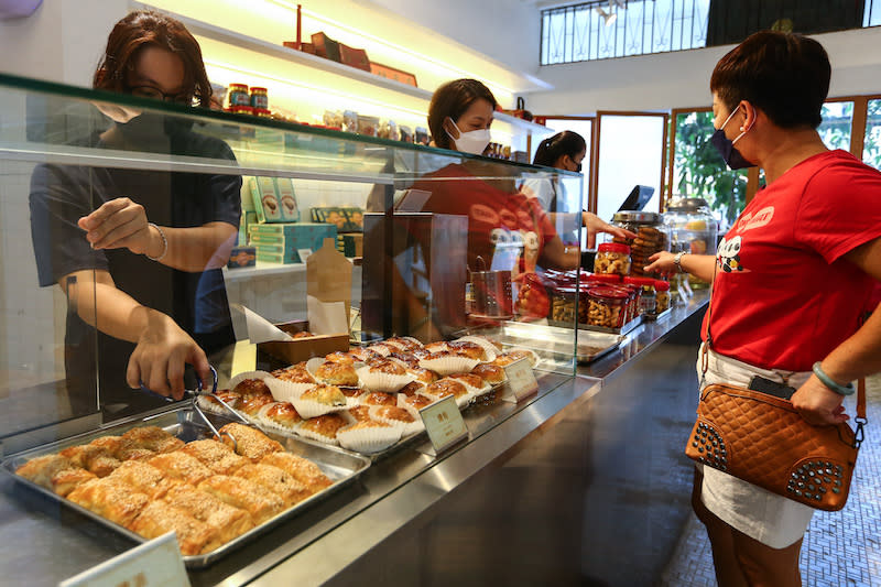 Chinese New Year cookies can be seen at the counter. — Picture by Ahmad Zamzahuri