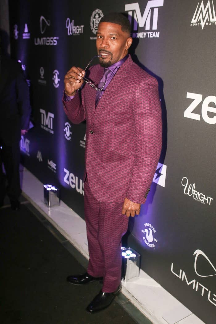Closeup of Jamie Foxx at a red carpet event in a patterned suit