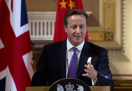 Britain's Prime Minister David Cameron speaks during a news conference in London June 17, 2014. REUTERS/Neil Hall