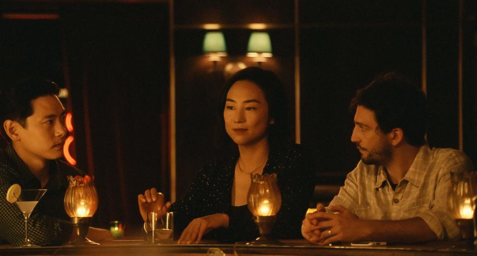 Teo Yoo, left, Greta Lee and John Magaro are caught in a love triangle in "Past Lives."