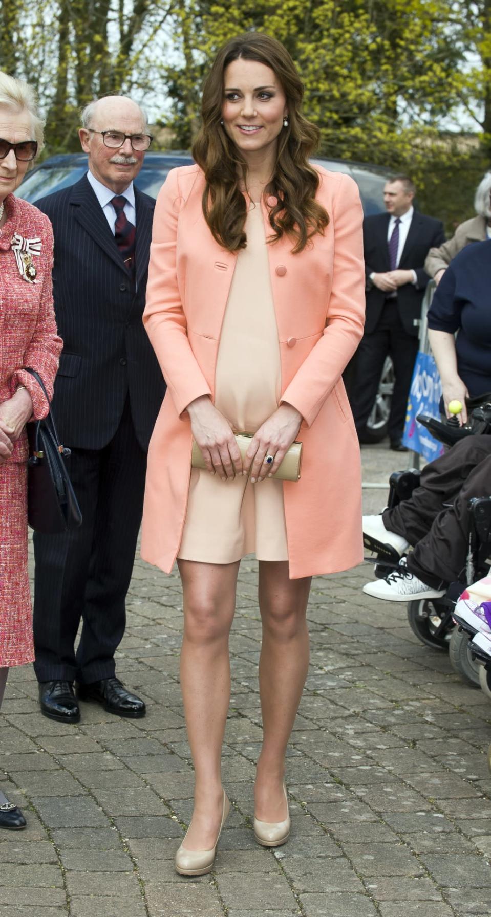 Meeting with terminally ill children and young adults at the Naomi House Children’s Hospice, Middleton wore a peach coat by Tara Jarmon with LK Bennett pumps and a custom-made dress.