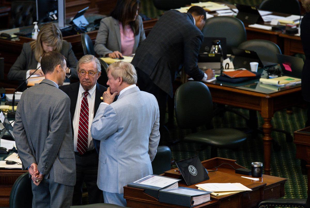 From left, House Impeachment Manager Andrew Murr, R-Junction speaks with prosecution lawyers Dick DeGuerin and Rusty Hardin during a short recess on the second day of the impeachment trial for suspended Attorney General Ken Paxton Wednesday, Sept. 6, 2023 in Austin.