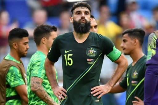 Mile Jedinak says his Australia team still believe they can reach the knockout stage