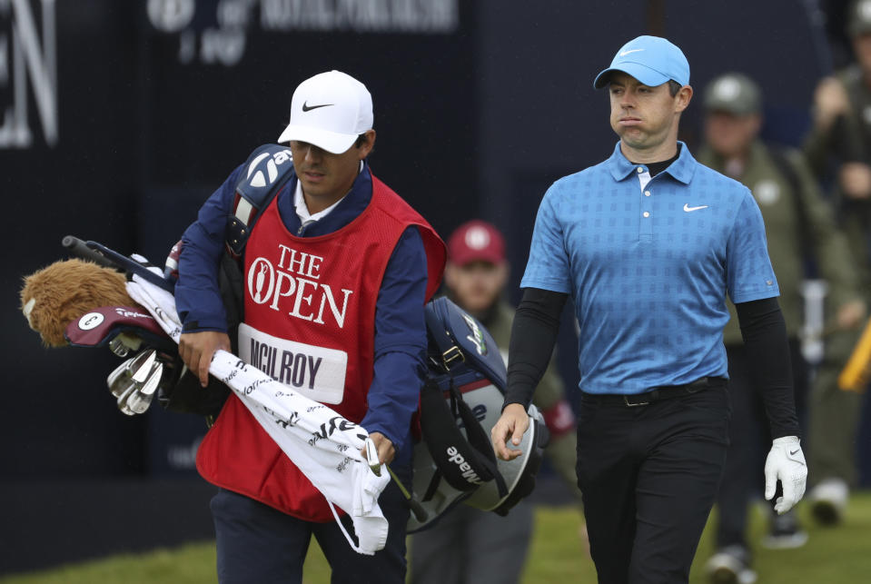 Northern Ireland's Rory McIlroy reacts after hitting his tee shot on the 1st hole into the long rough during the first round of the British Open Golf Championships at Royal Portrush in Northern Ireland, Thursday, July 18, 2019.(AP Photo/Peter Morrison)