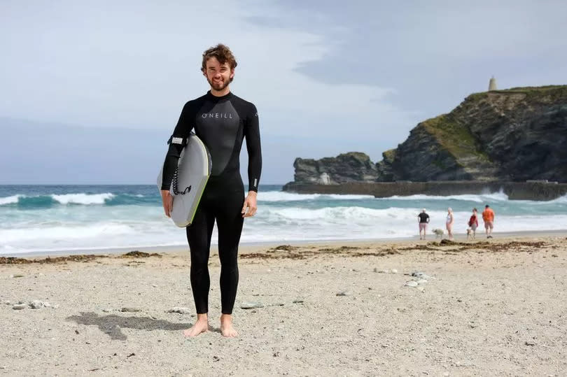 Surfer Jamie Luther pictured on Portreath beach