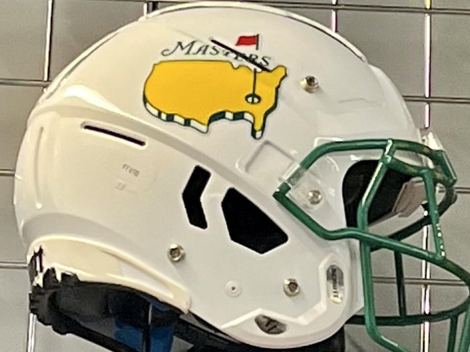 A football helmet commemorating the 2020 Masters Tournament that was played in the fall hangs in the Jaguars equipment room at the Miller Electric Center.