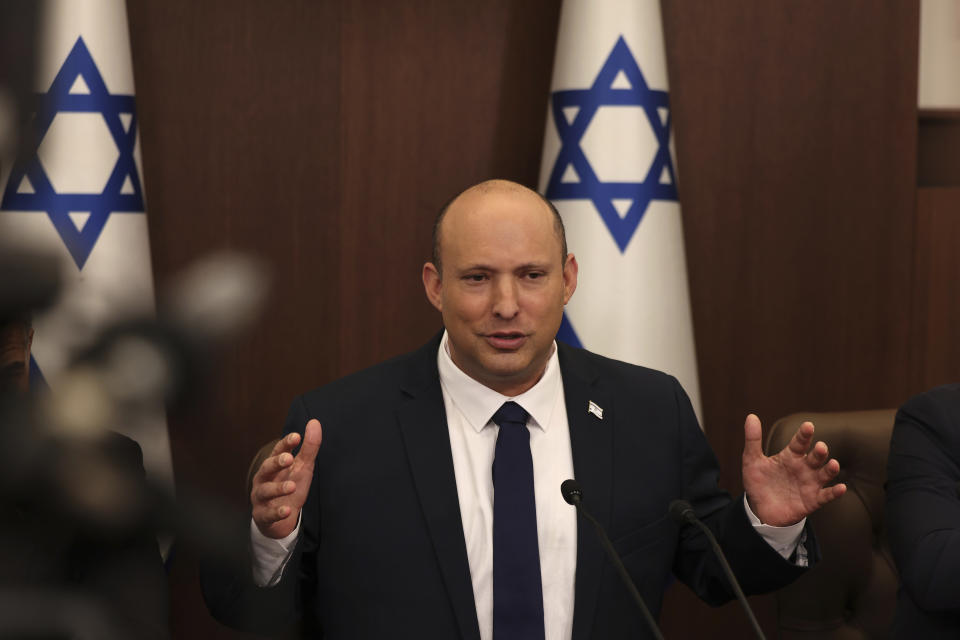 FILE - Israeli Prime Minister Naftali Bennett speaks during a weekly cabinet meeting in Jerusalem, May 1, 2022. Bennett was on a surprise visit to the United Arab Emirates on Thursday, June 9, 2022, a snap trip that came as efforts to salvage a deal over Iran's nuclear program were stalled amid a deepening standoff with Tehran. The visit was Bennett's second public trip to Abu Dhabi since Israel and the UAE agreed to normalize ties in 2020. (Menahem Kahana/Pool Photo via AP, File)