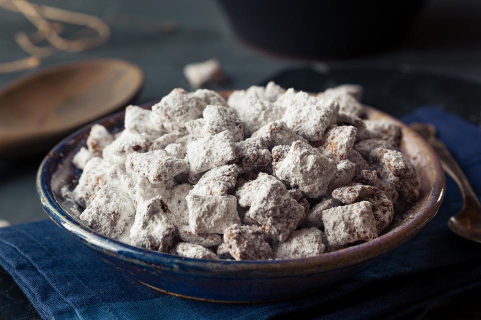 <p>Whether you call them muddy buddies, puppy chow, monkey munch or another name, these chocolatey, peanut buttery, powder-sugar-coated treats are a <a href="https://www.thedailymeal.com/cook/nostalgic-childhood-desserts?referrer=yahoo&category=beauty_food&include_utm=1&utm_medium=referral&utm_source=yahoo&utm_campaign=feed" rel="nofollow noopener" target="_blank" data-ylk="slk:delightful childhood dessert you forgot about;elm:context_link;itc:0;sec:content-canvas" class="link ">delightful childhood dessert you forgot about</a> — unless you’re at a potluck in the Midwest, that is. If you’re allergic to peanuts, feel free to swap for the nut (or nut-free) butter of your choice.</p> <p><a href="https://www.thedailymeal.com/recipes/homemade-muddy-buddies-recipe?referrer=yahoo&category=beauty_food&include_utm=1&utm_medium=referral&utm_source=yahoo&utm_campaign=feed" rel="nofollow noopener" target="_blank" data-ylk="slk:For the Homemade Muddy Buddies recipe, click here.;elm:context_link;itc:0;sec:content-canvas" class="link ">For the Homemade Muddy Buddies recipe, click here.</a></p>