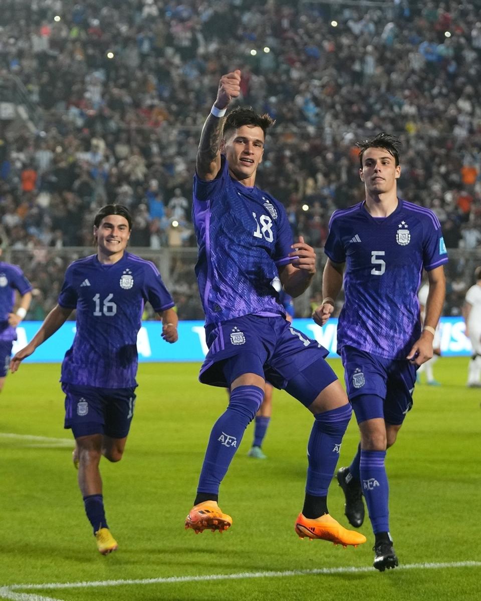 CORRECTS NUMBER OF GOALS SCORED - Argentina's Brian Aguirre, center, celebrates scoring his side's fourth goal against New Zealand during a FIFA U-20 World Cup Group A soccer match at the San Juan stadium in San Juan, Argentina, Friday, May 26, 2023. (AP Photo/Natacha Pisarenko)