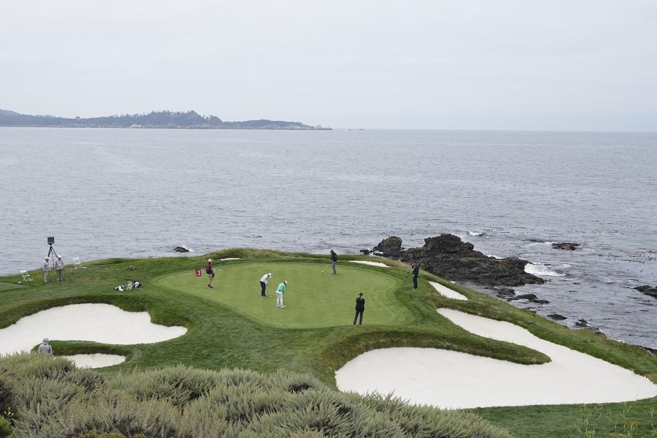 Annika Sorenstam, of Sweden, and Sadie Englemann putt on the seventh green during a practice round for the U.S. Women's Open golf tournament at the Pebble Beach Golf Links, Wednesday, July 5, 2023, in Pebble Beach, Calif. (AP Photo/Darron Cummings)