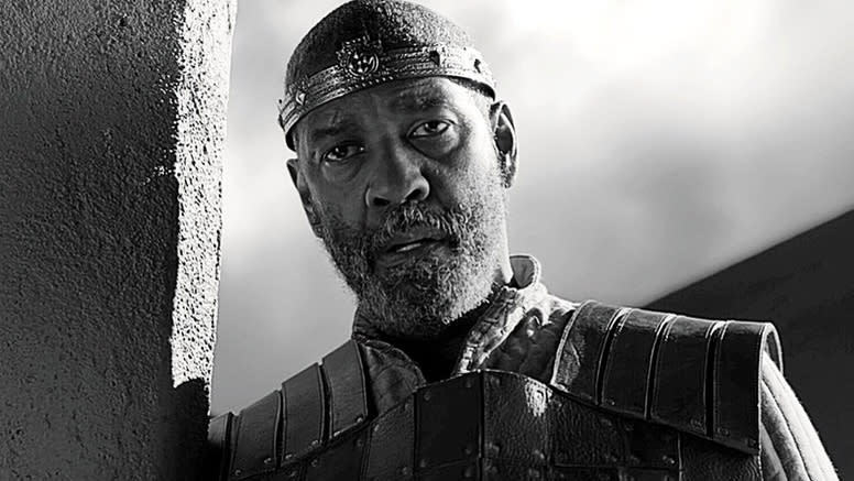 Denzel Washington wearing a crown as Macbeth